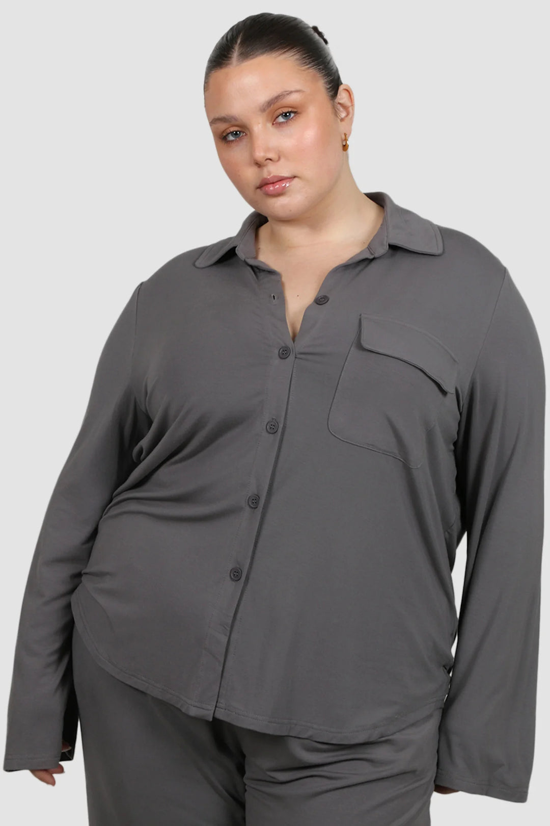 plus size woman wearing dark grey basic long sleeve