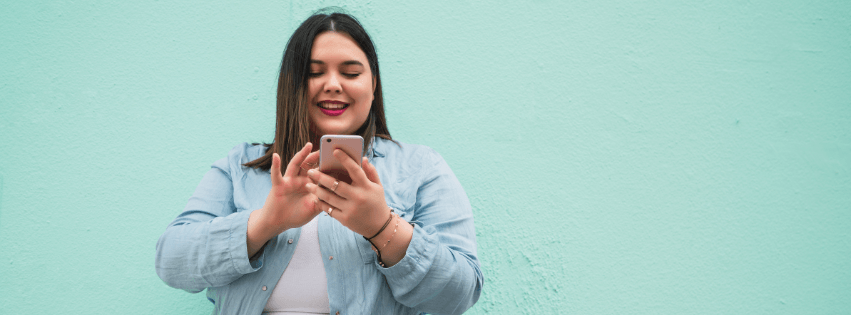 Plus size woman on her phone