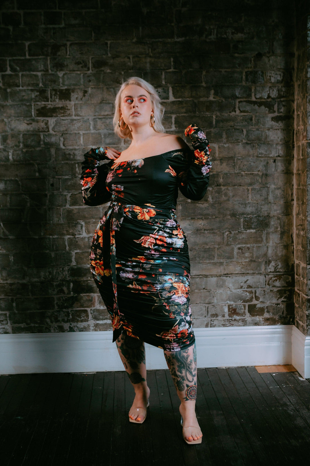 Plus size model wearing plus size dress available on Leukbook from Australian size inclusive designer