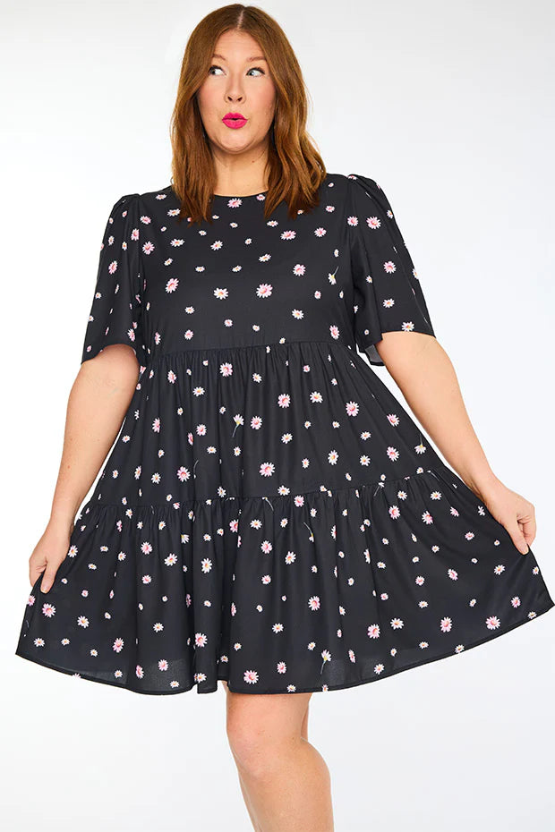 plus size woman wearing mini floral print dress