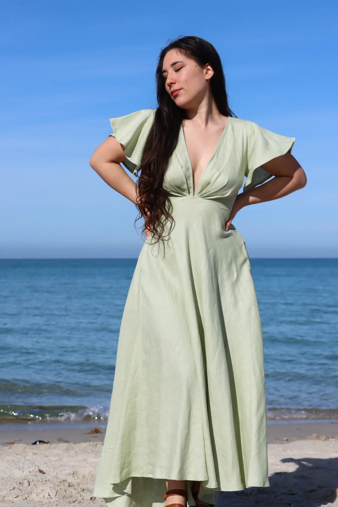 woman in green maxi dress