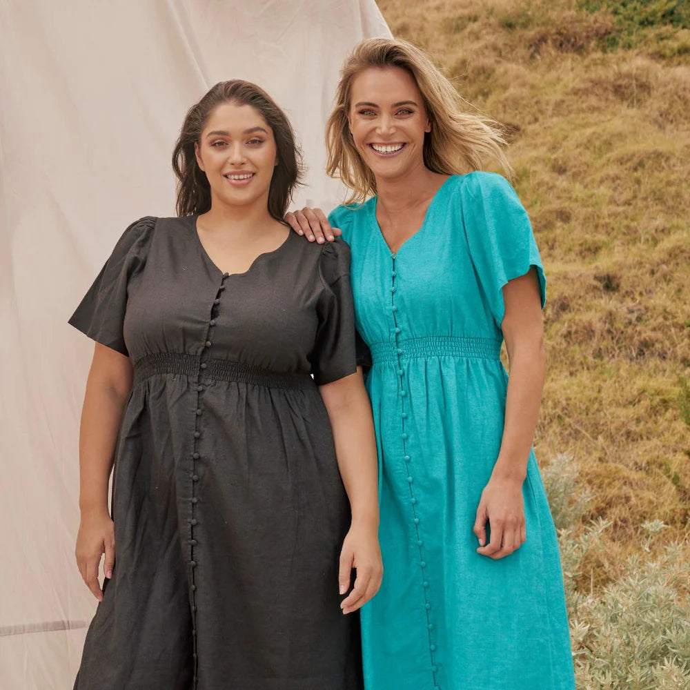 women wearing black and blue maxi dress