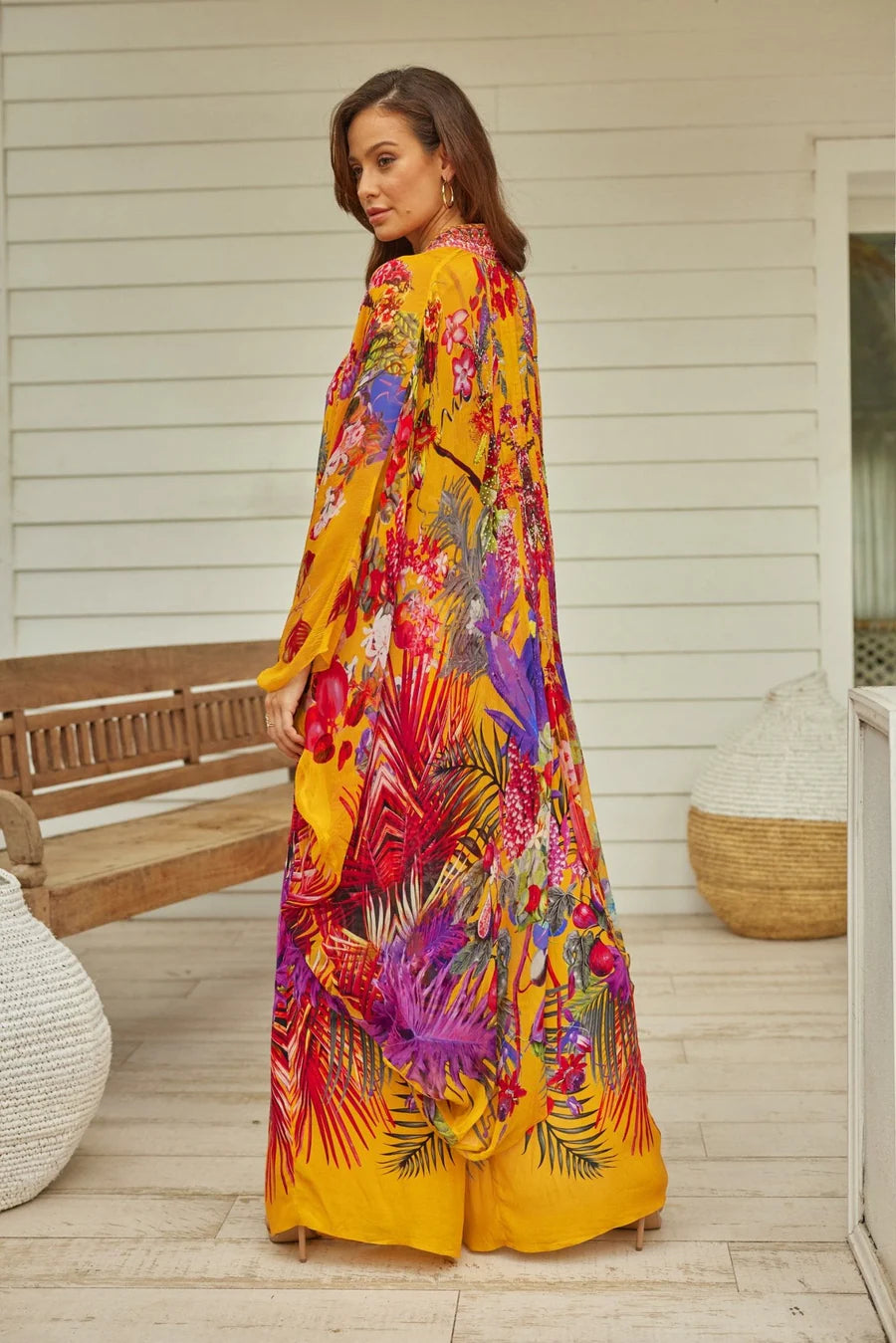 woman wearing colourful kaftan maxi dress